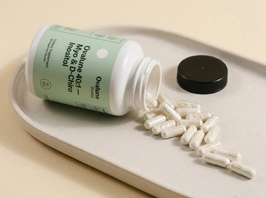120 white capsules spilling from the bottle