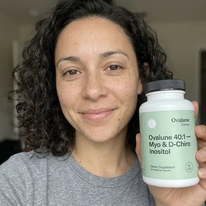 Megan T., verified buyer, holding her Ovalune bottle