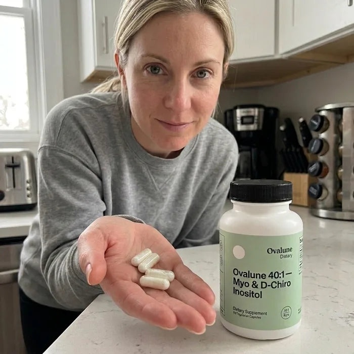Danielle K., verified buyer, with her morning capsules